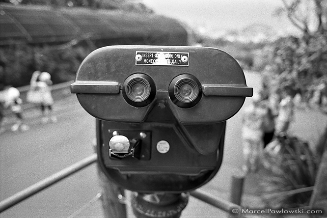 Black and white Touristscope portrait of a coin-operated binocular in tha zoo of Sydney, Australia.